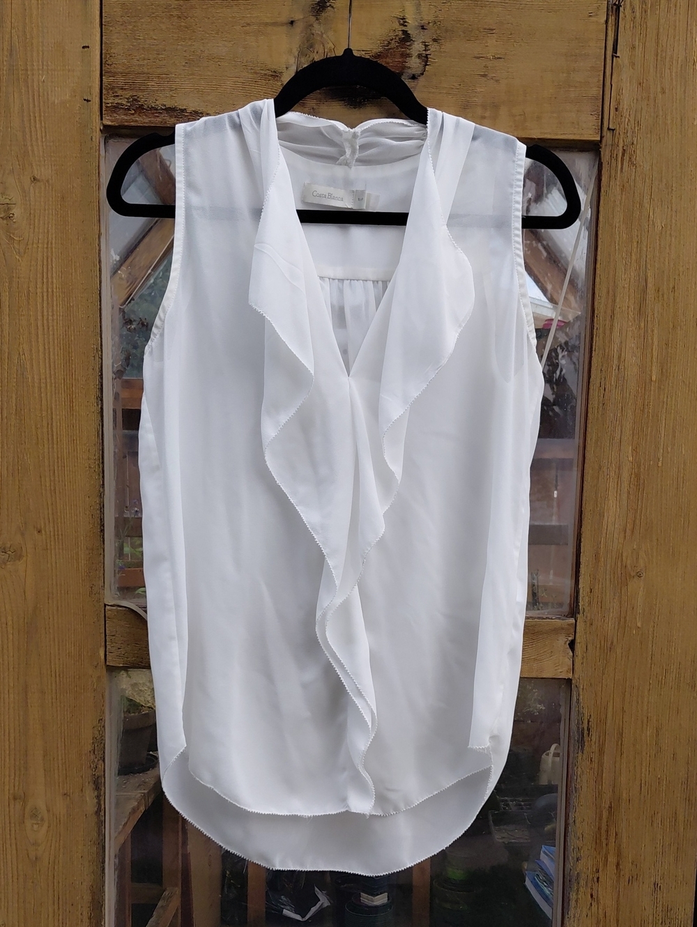 Costa Blanca White Ruffle V-Neck Sleeveless Blouse